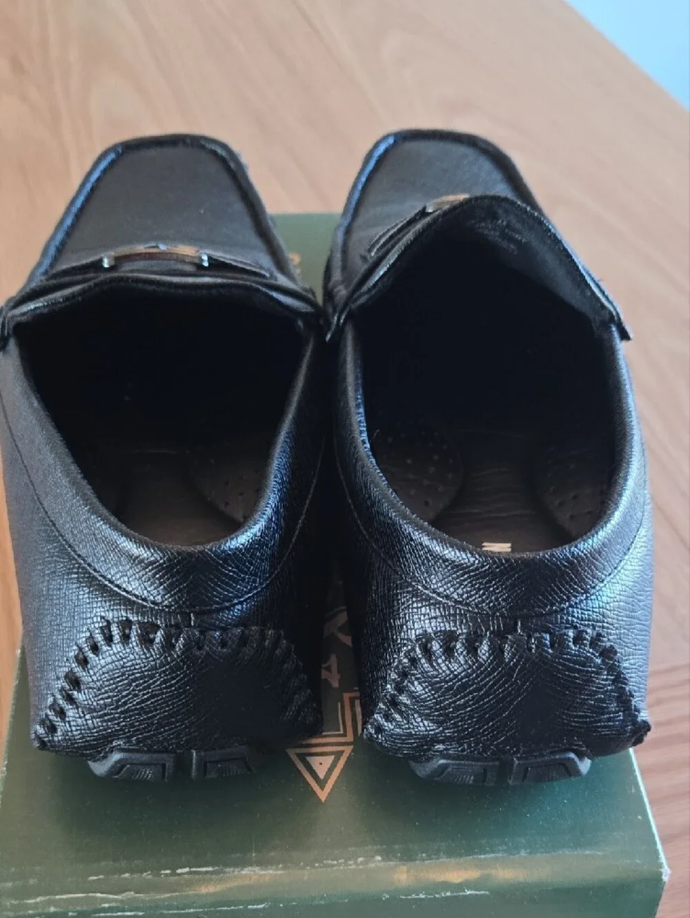 Black Men’s Slip-On Loafers with Silver Accent